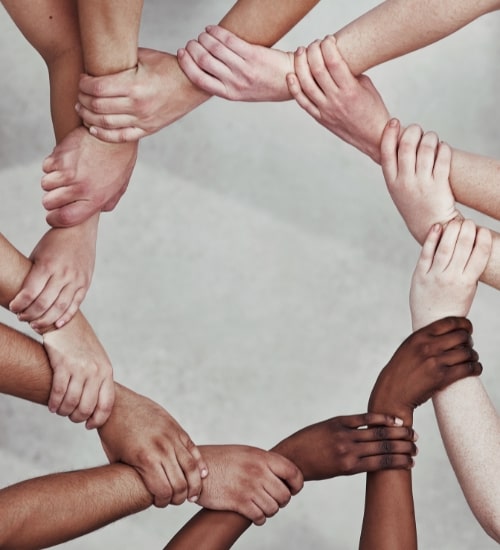 community holding others arms